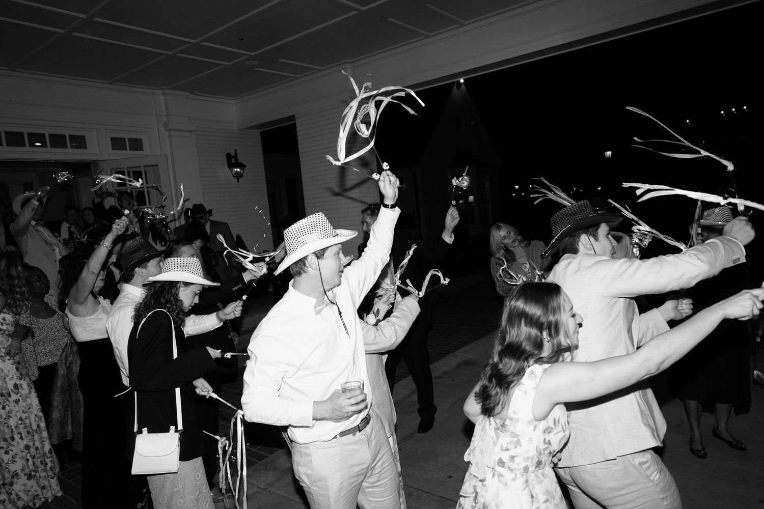 Black and white photographs show couples dancing at what appears to be a swing dance social gathering or event.