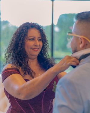 A couple shares an intimate moment during their wedding celebration.