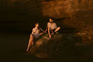 A series of six similar photos showing people sitting on a rocky cliff formation in warm sunset lighting.