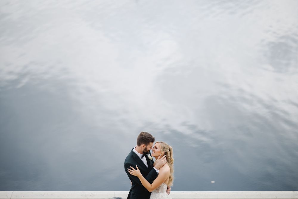 Romantic wedding portrait by the serene river at Waterworks in Philadelphia — elegant, timeless, and perfect for waterfront weddings.