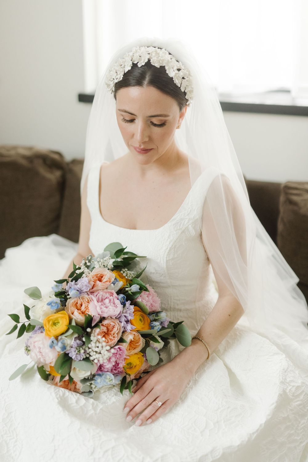 Elegant bridal portrait with colorful bouquet at the Fitler Club in Philadelphia, perfect light and timeless wedding style.