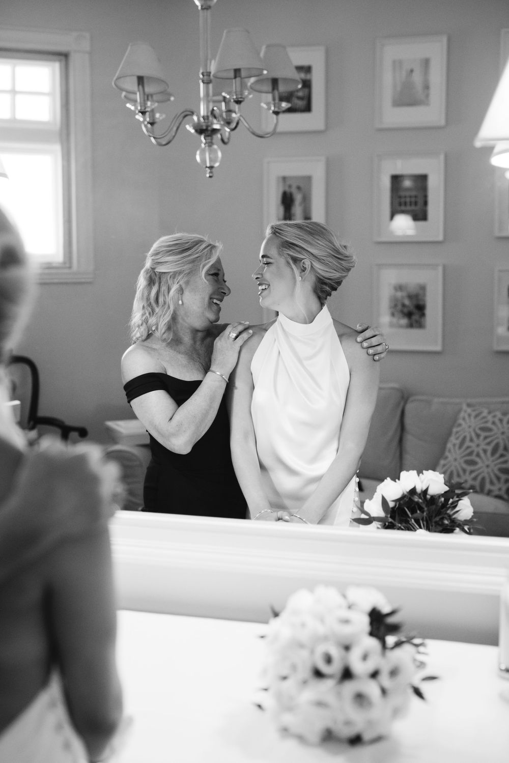 Bride getting ready at Philadelphia Cricket Club, captured in a candid moment full of elegance and anticipation before the ceremony.