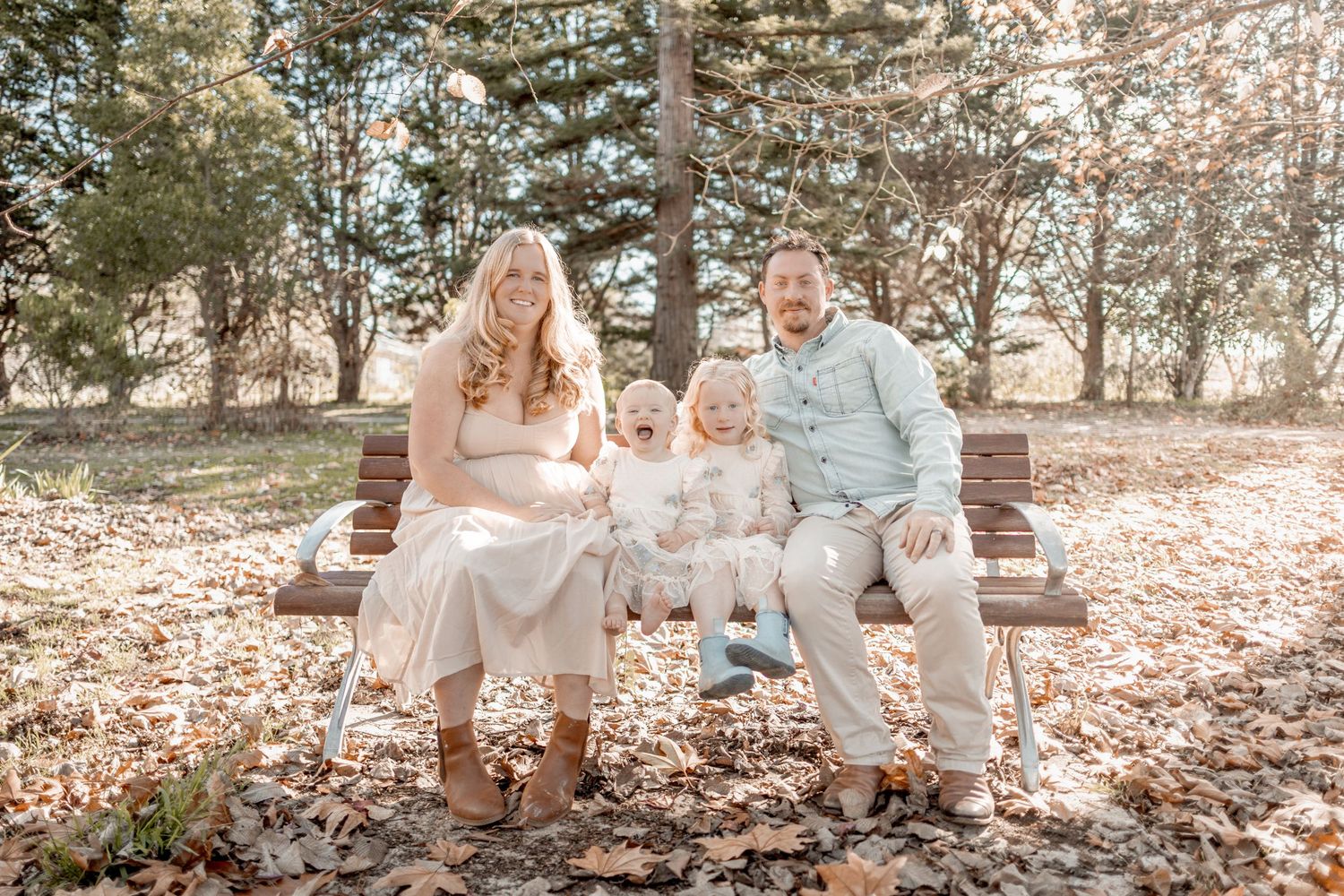 country setting family photo with dog and babys