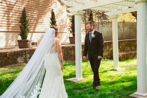 A romantic wedding photo collage showing multiple shots of a couple outdoors near white pillars and flower trellises.