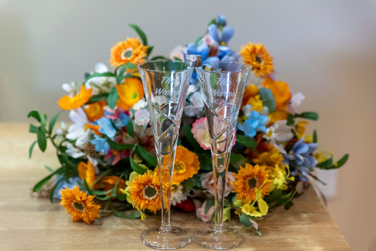 details of bouquet and sweethearts' goblets