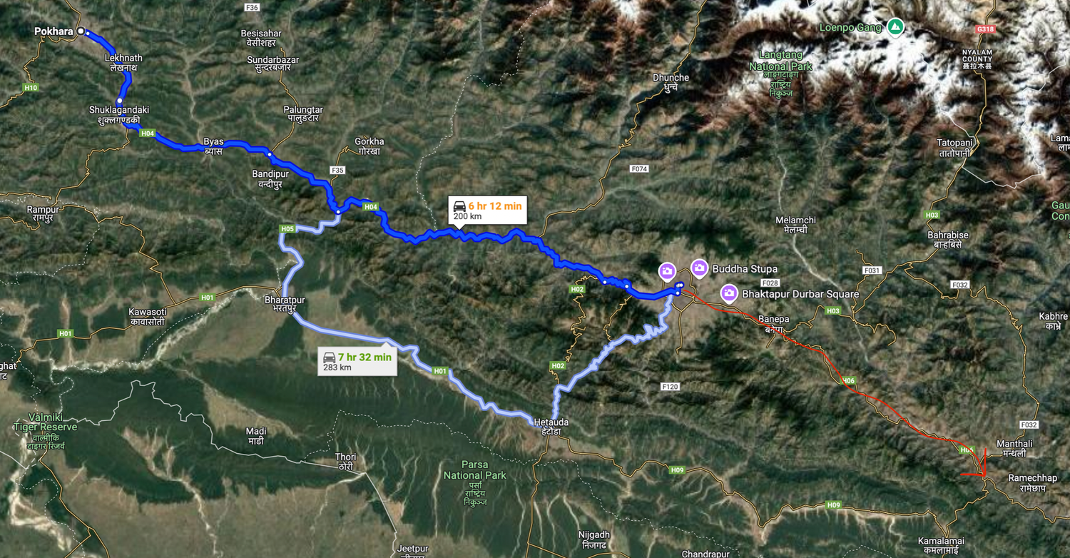 Satellite map view showing a blue route through mountainous terrain.