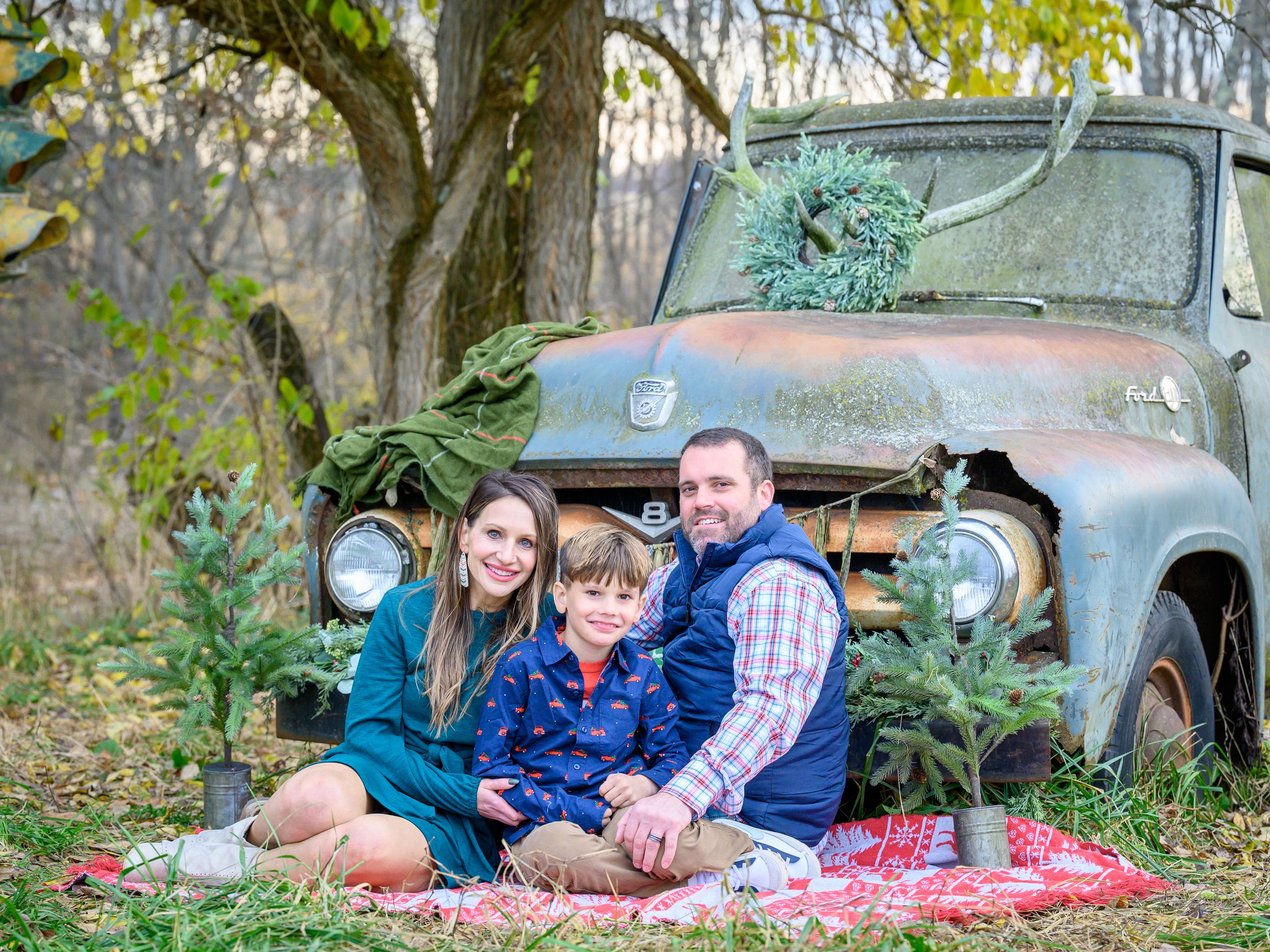 Portrait of a Family in front of an old truck