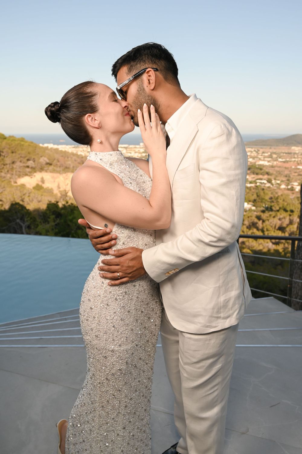 Bride and groom photo booth kiss at a private villa in Ibiza