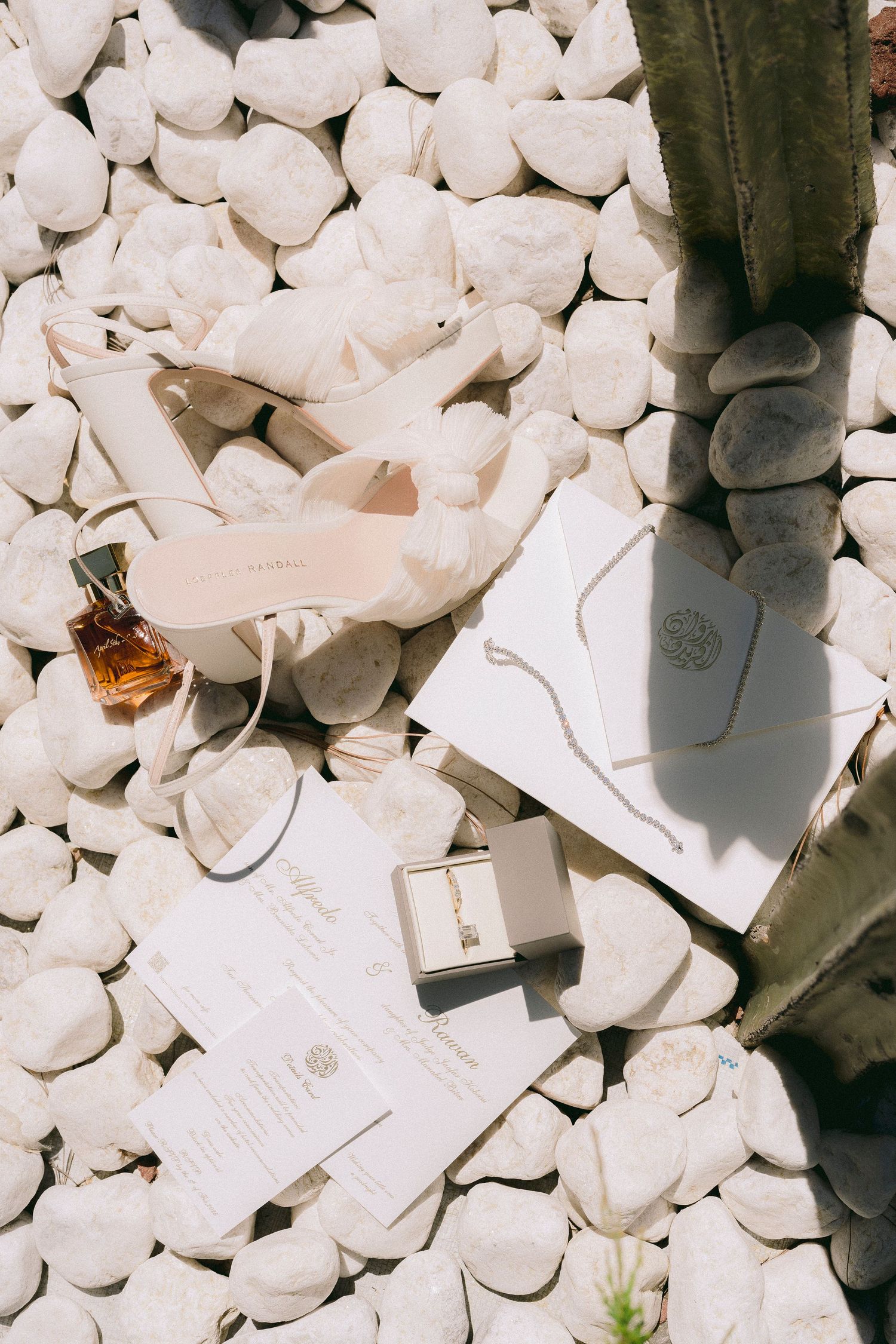 Scattered used tea bags with white tags on a light background create an artistic still life composition.
