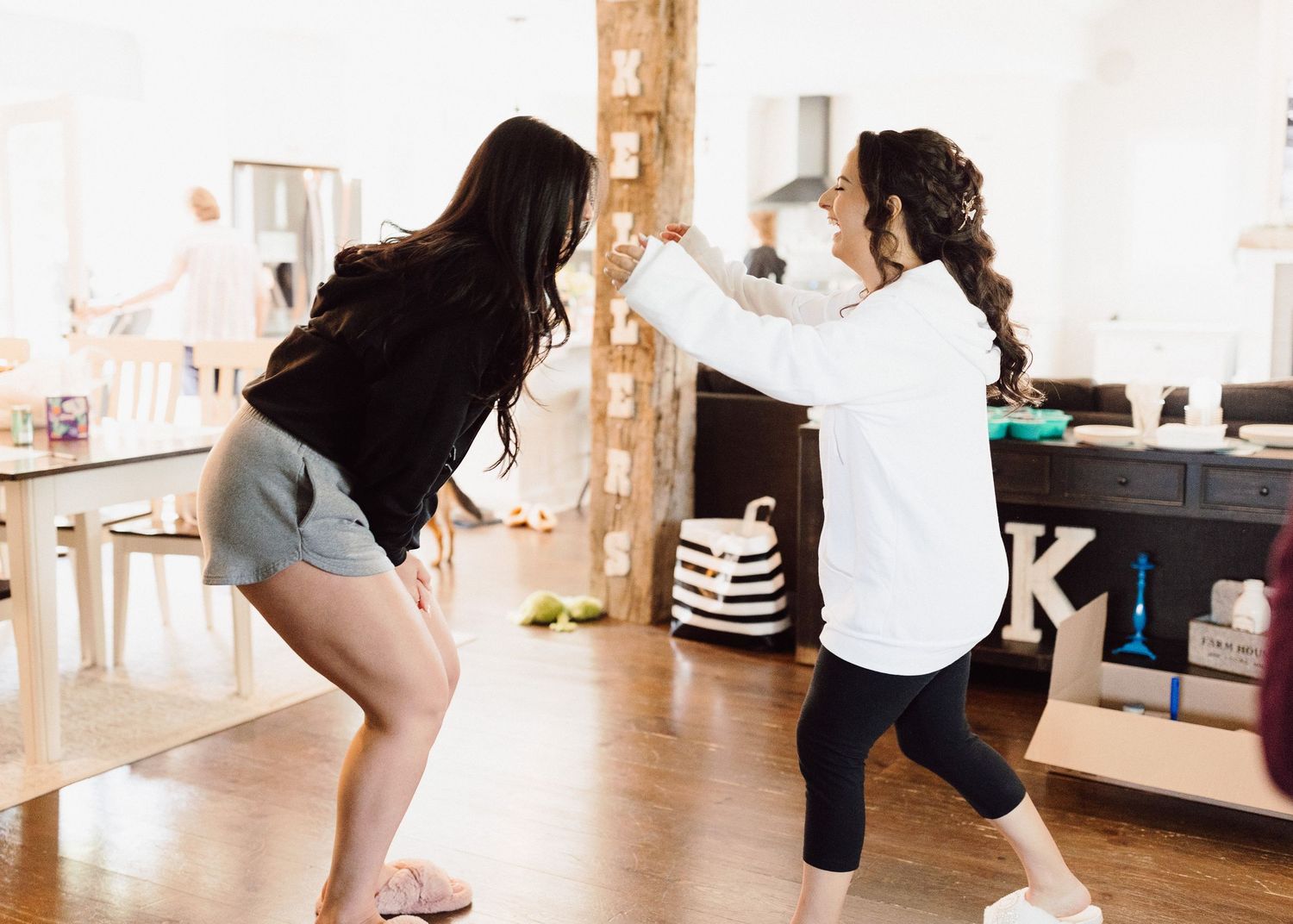 A sequence of dance or movement photos showing people in a bright studio space.