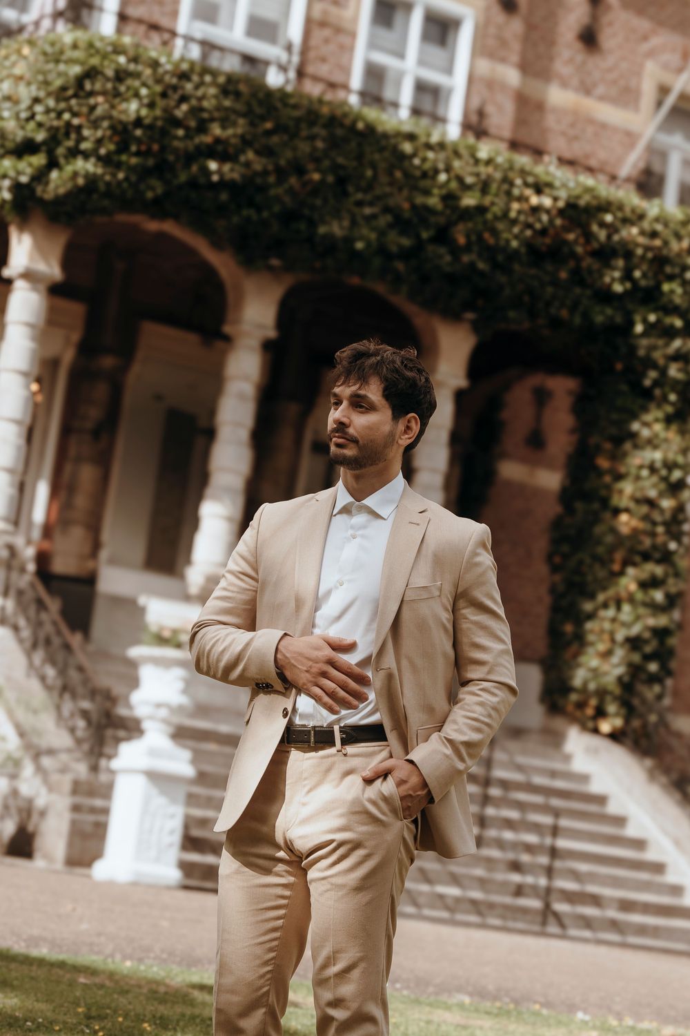Sequential photos showing different poses in formal attire against a historic brick building with columns.