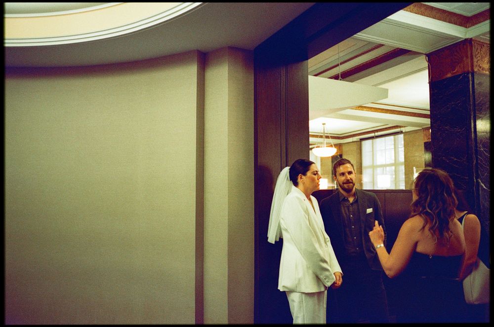 candid wedding reception photos showing couple moments before they are married at city hall