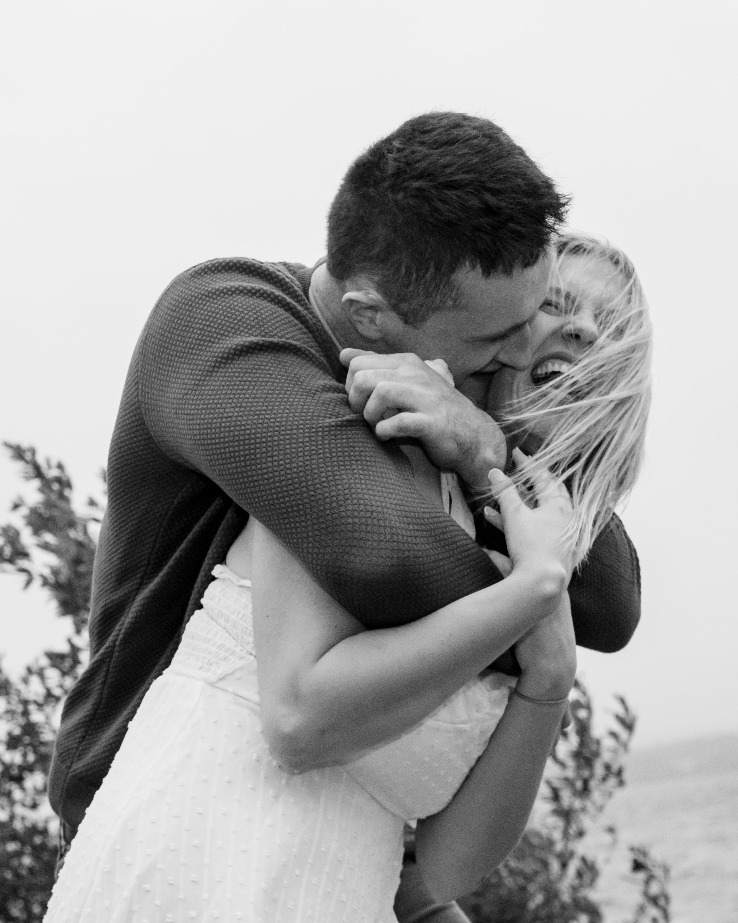 Black and white close-up photo sequence showing intimate moments between two people outdoors.