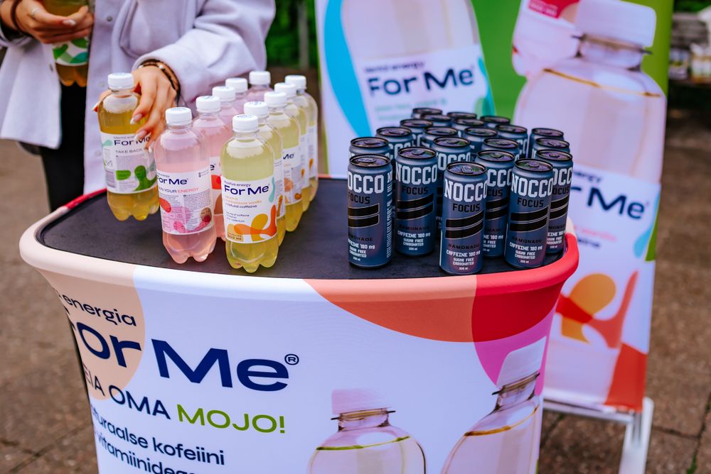 Display of ForMe branded drinks and refreshments at an outdoor event.