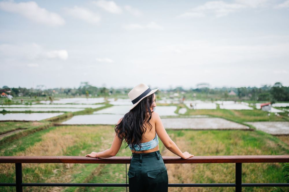 Lifestyle fashion photography in Bali with ricefield view