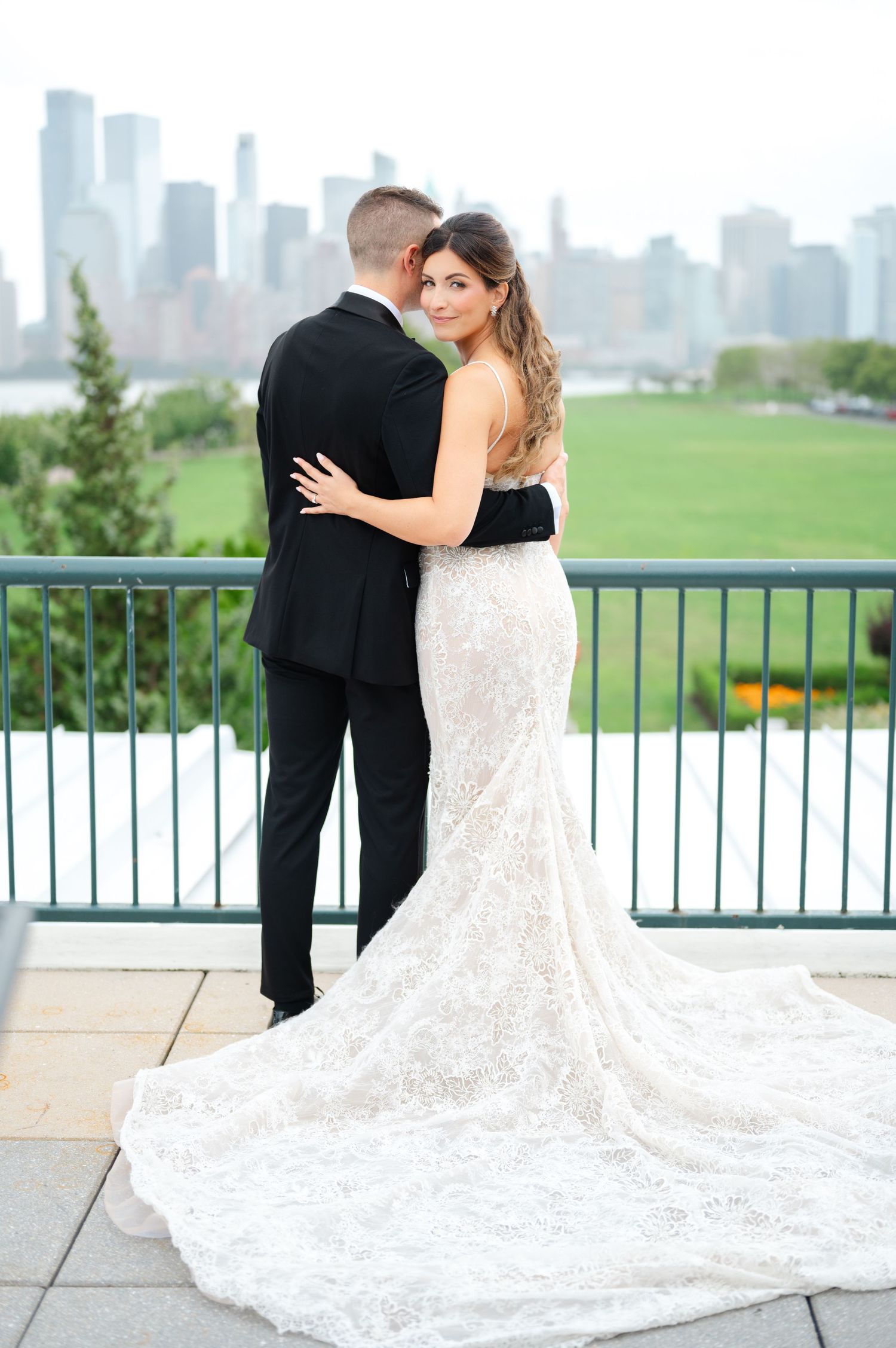 A romantic sunset wedding photo series showing a couple embracing and dipping in a golden-lit garden setting.