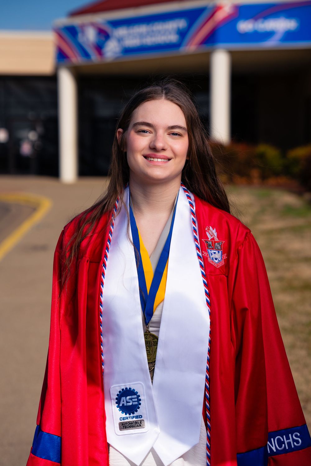 Senior portraits with cap and gown in Bardstown