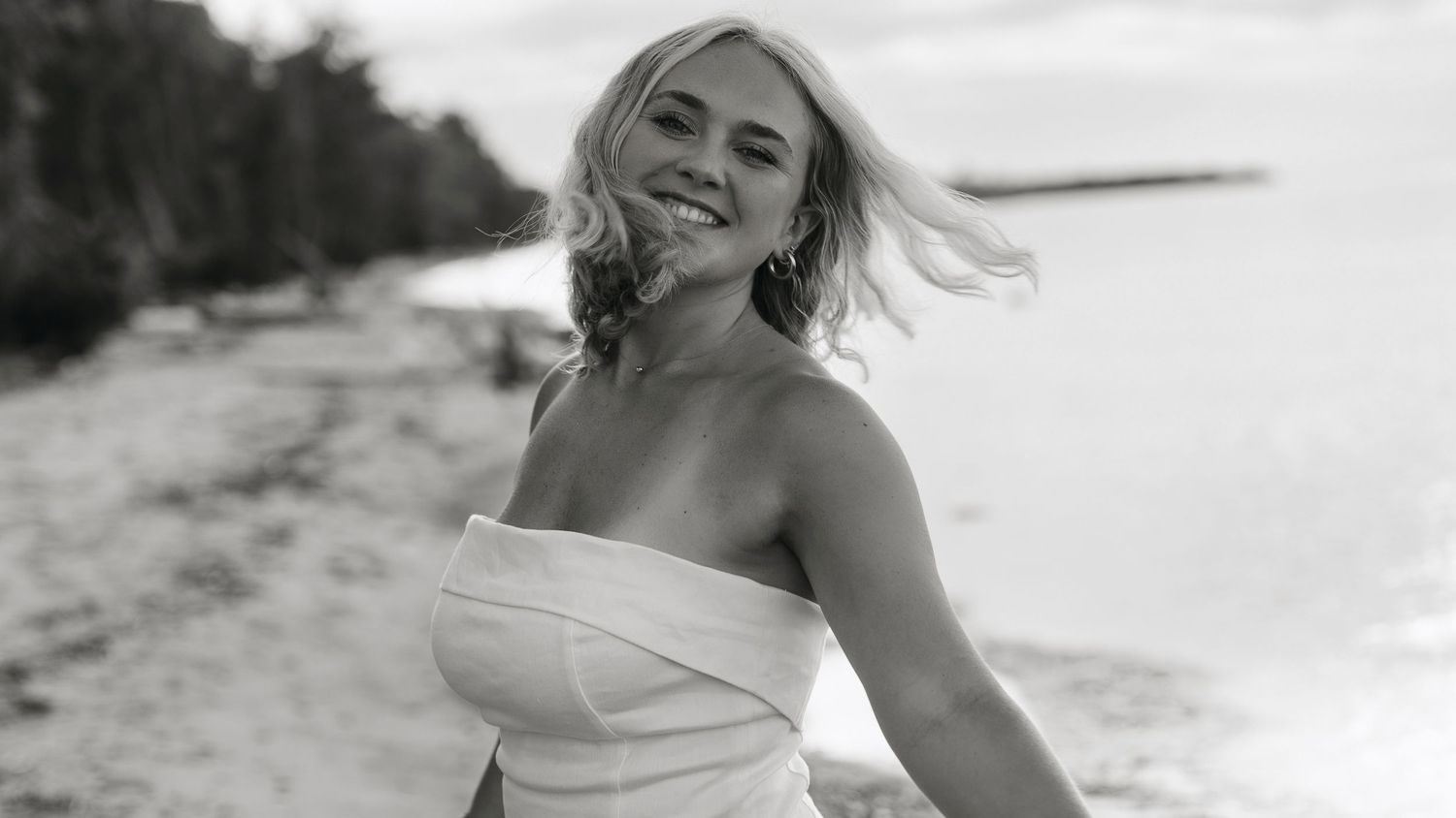 A series of black and white photos showing joyful moments captured at a beach wedding celebration.