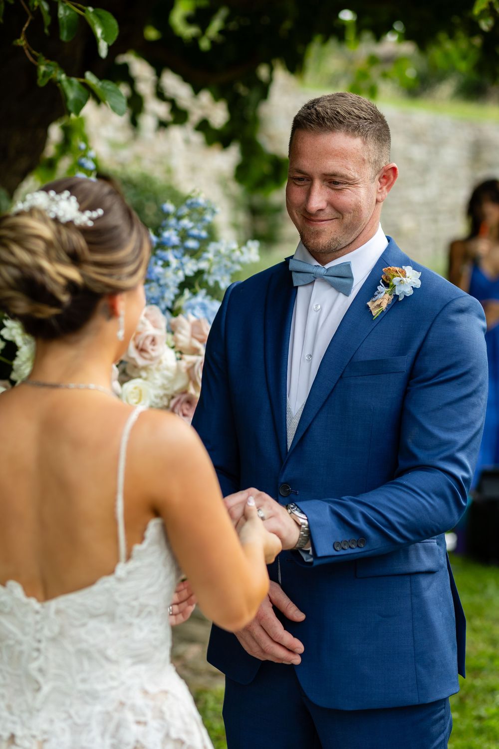 Emotional exchange of vows captured in the heart of historic Assisi, Italy.