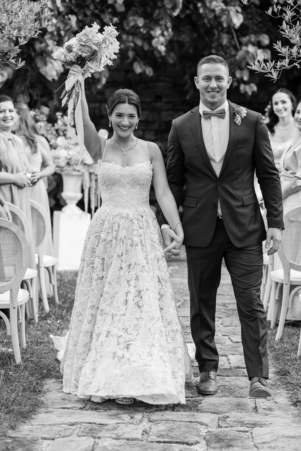 Destination wedding couple styled in classic Italian elegance at Umbria’s Nun Relais.
