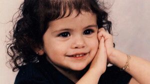 Four connected photos show a young child in different candid poses against a light background.