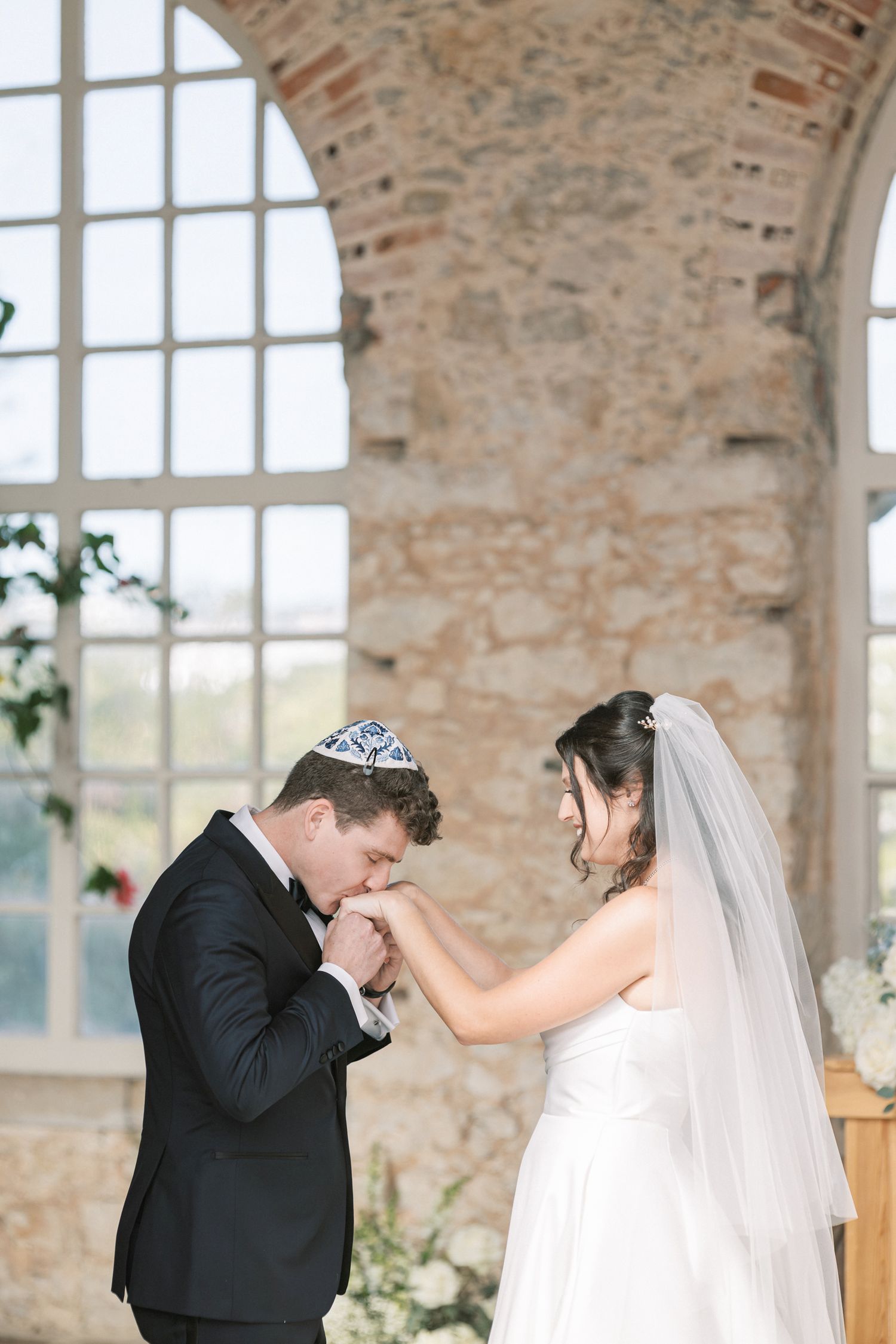 Emotional first look between bride and groom at Forte da Cruz in Cascais Portugal