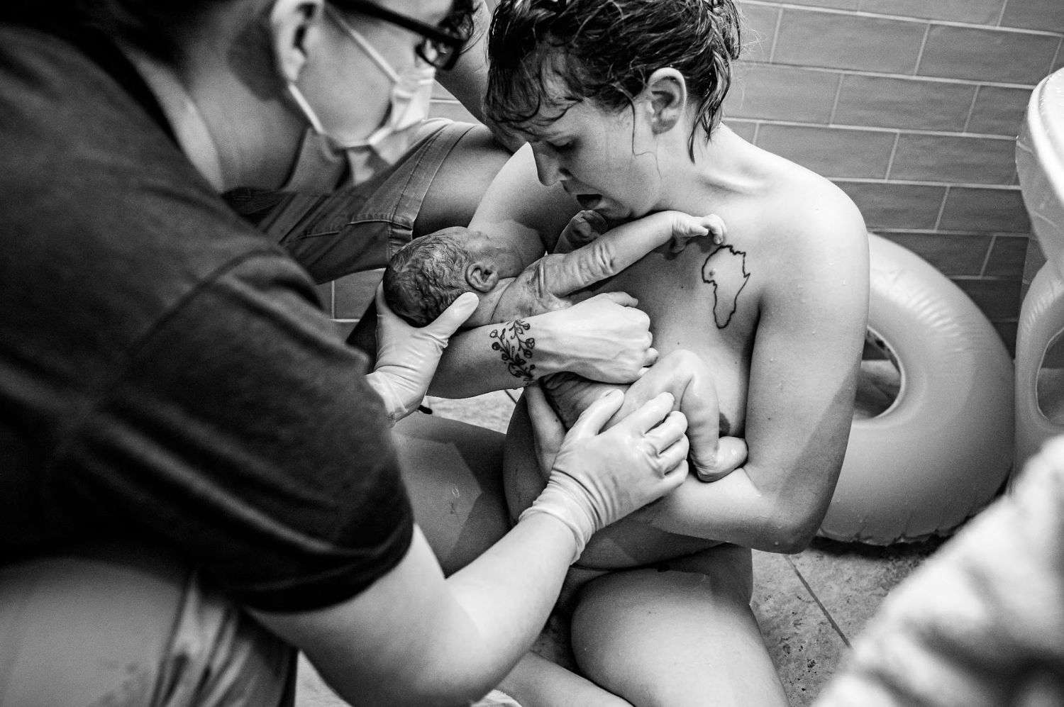 Healthcare providers offering support and care after delivery of baby