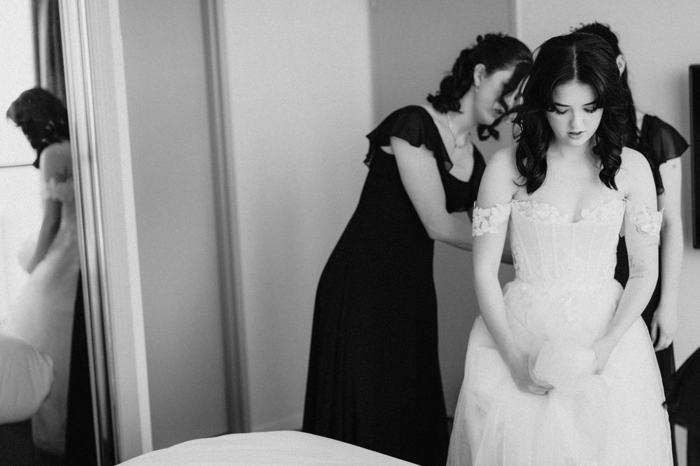 •	Bride zips up gown, Gold Coast wedding prep at Braeside Estate begins