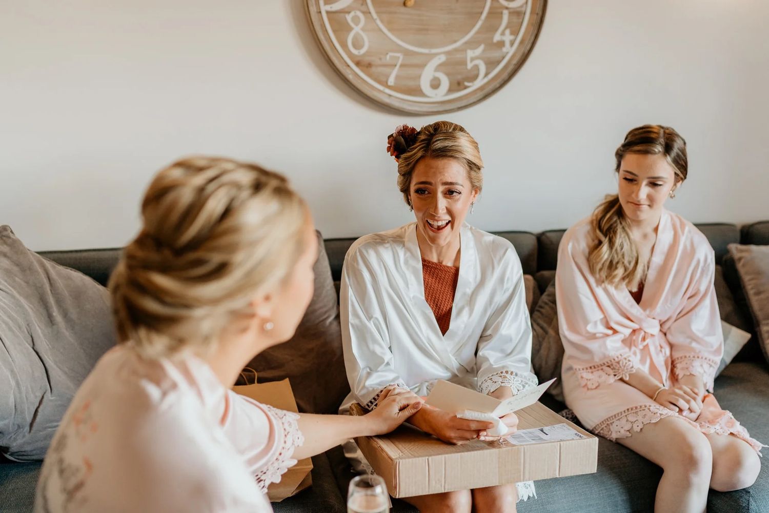 Elegant morning preparations in a bright room with group gathering around.