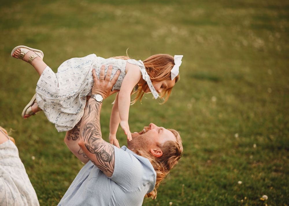 Joyful family interactions captured in a series of candid moments at sunset.