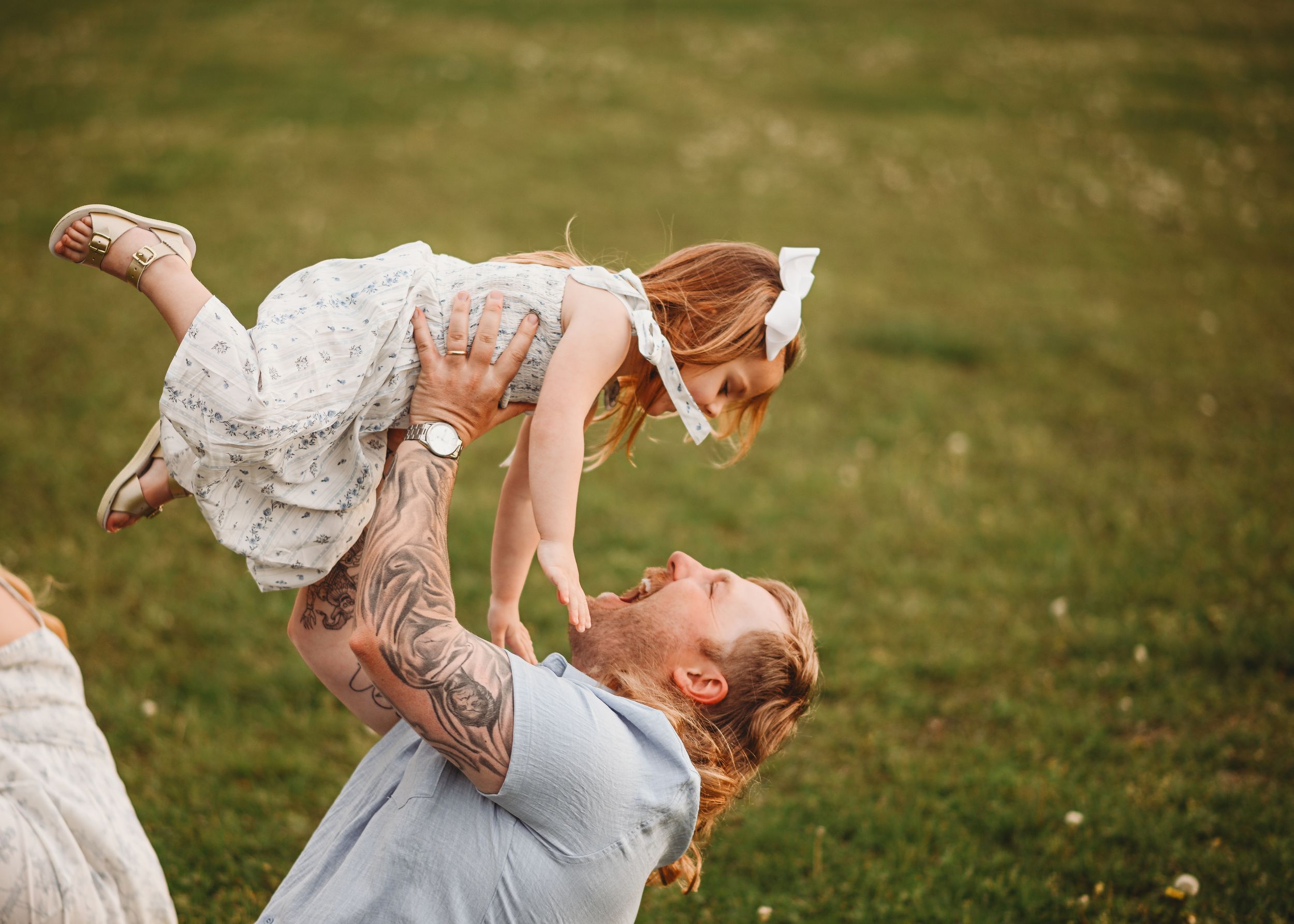 Joyful family interactions captured in a series of candid moments at sunset.