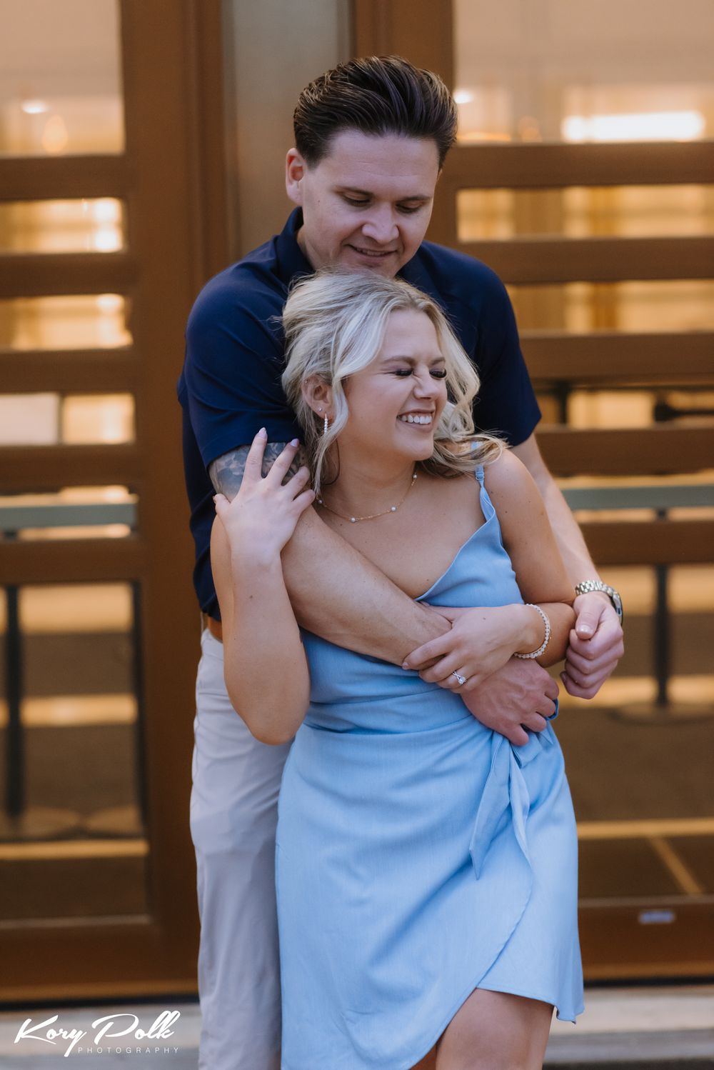 engagement photos of des moines couple at supreme court building, des moines wedding photographer