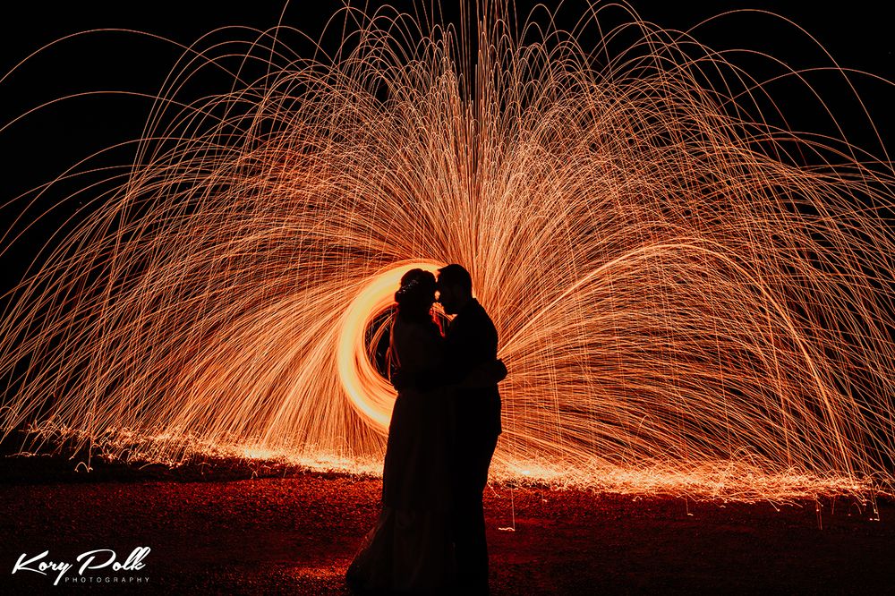 wedding of iowa couple at harpors vineyard, spinning steel wool, des moines wedding photographer, Iowa wedding photographer