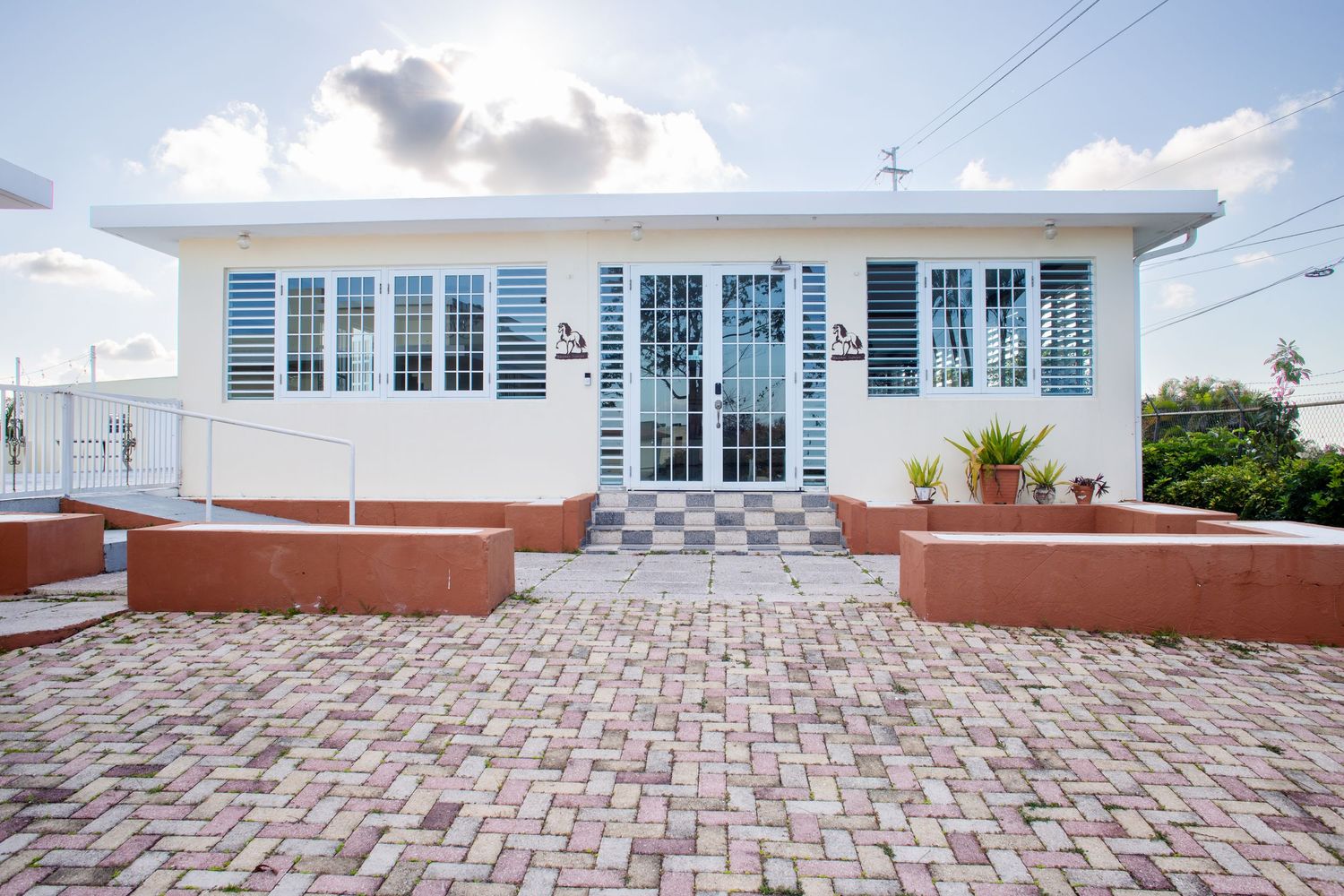 Real estate photo for a short-term rental in Aguas Buenas, Puerto Rico. Building exterior.