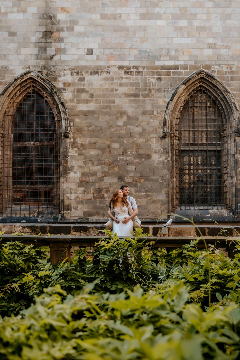 Romantic maternity portrait of Kayla with Barcelona’s Old City as the backdrop.