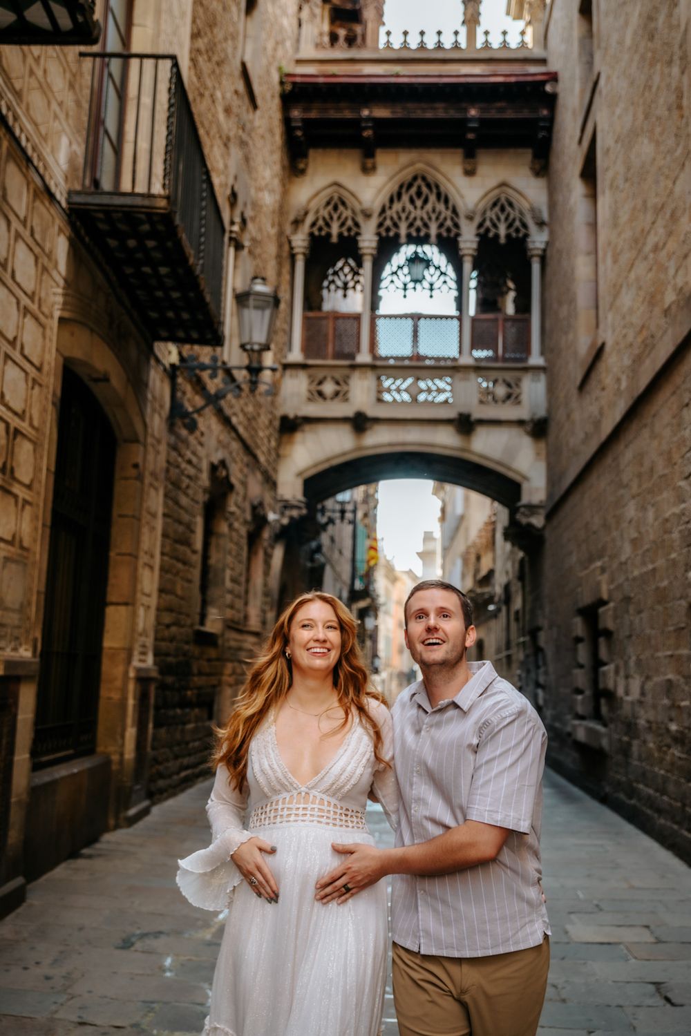 Kayla glowing with happiness during her maternity shoot in Old City Barcelona.
