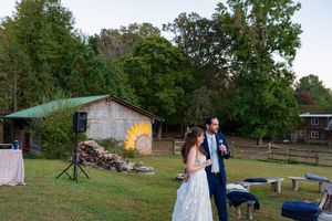 A series of outdoor wedding photos showing a couple celebrating their special day in a rustic countryside setting.