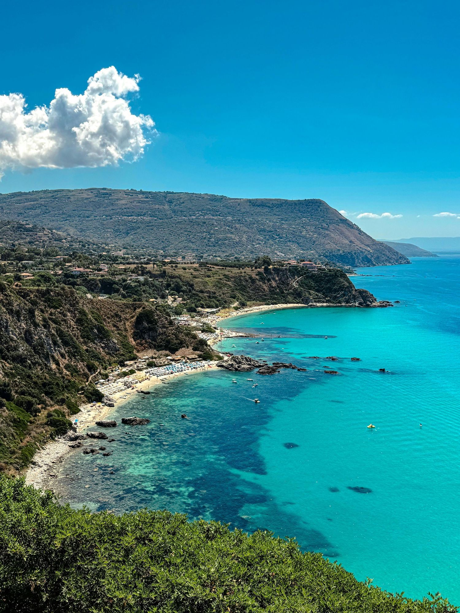 Aerial drone view of the coastline of Pizzo Calabro along the Tyrrhenian Sea, Calabria, Italy
