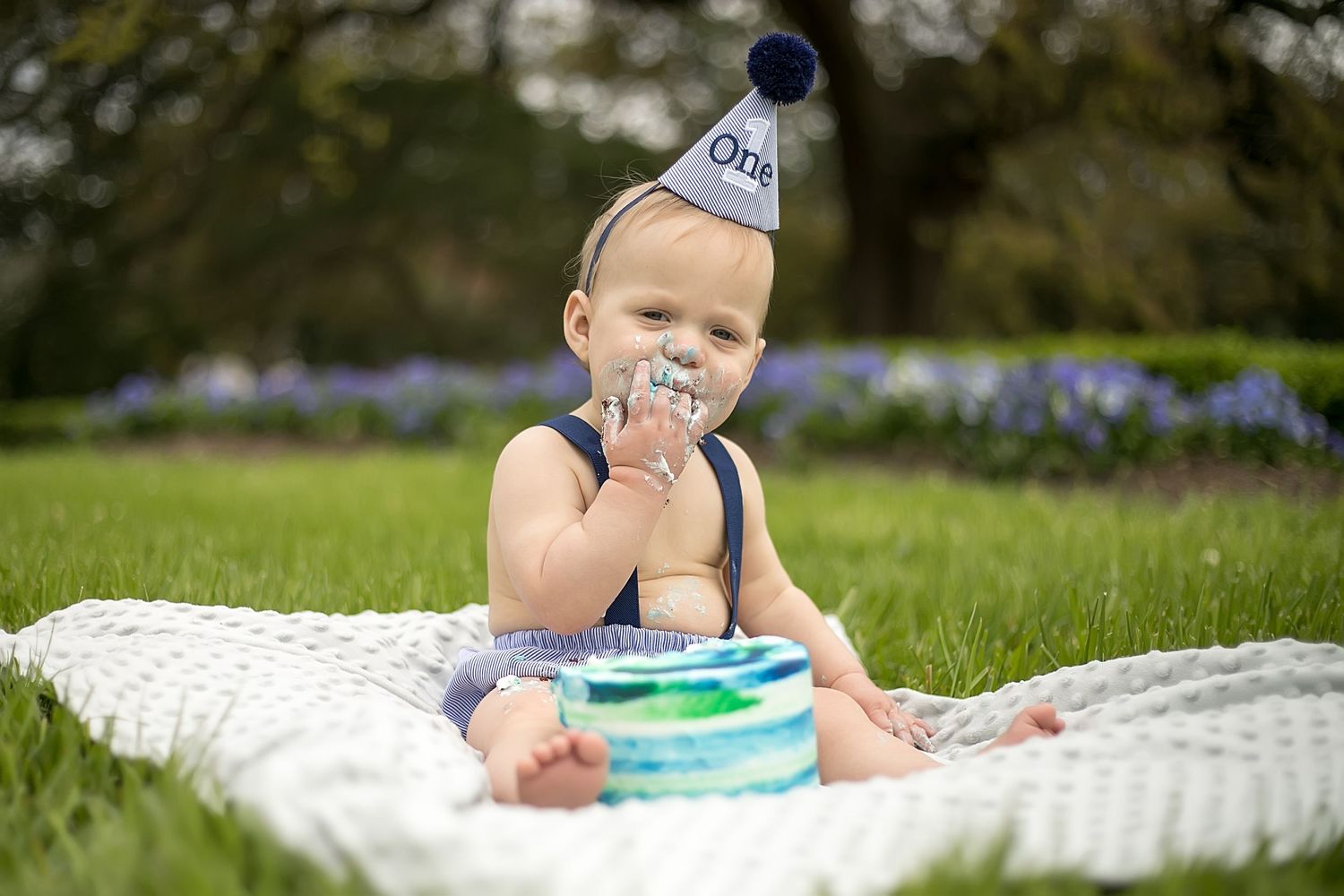 First birthday/smash cake pictures for one year old baby taken at the State Capitol Gardens in downtown Baton Rouge.