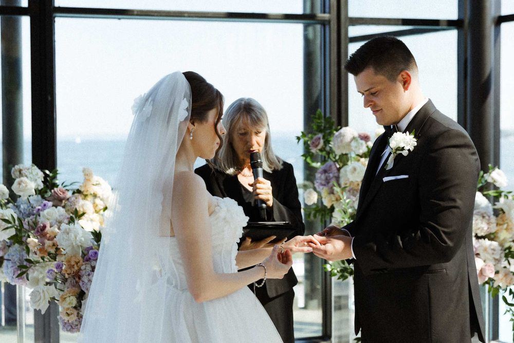 Wedding ceremony moments captured in sequence showing ring exchange and intimate gestures.