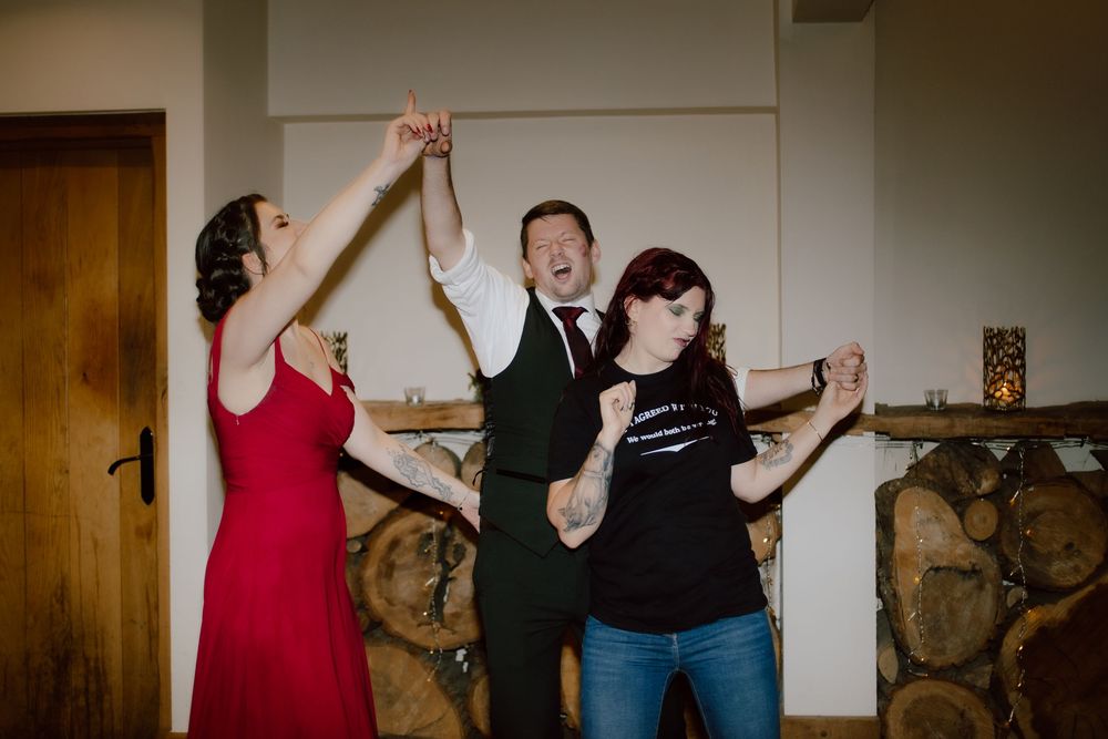 Four sequential photos show people dancing and laughing together in a living room setting.