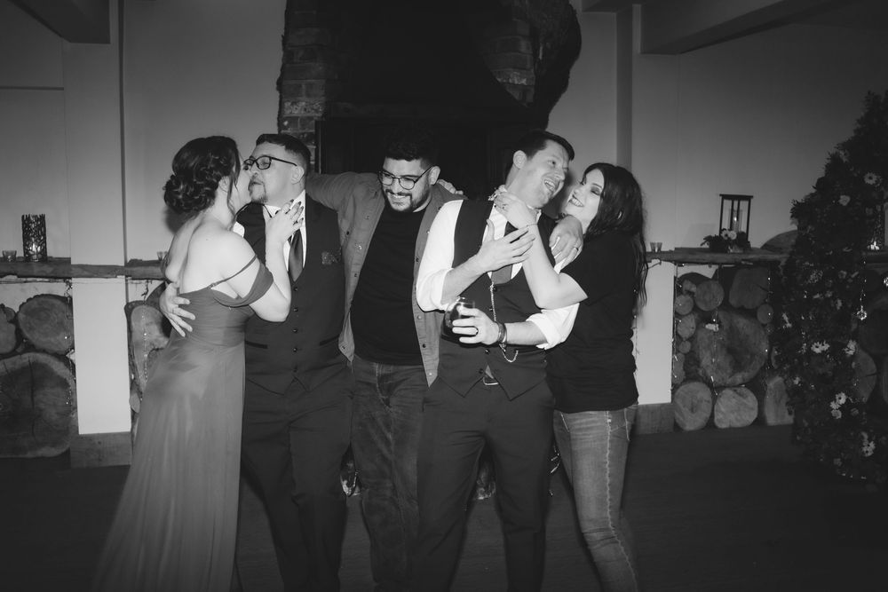 Vintage black and white photographs of people dancing and socializing at what appears to be a formal gathering.