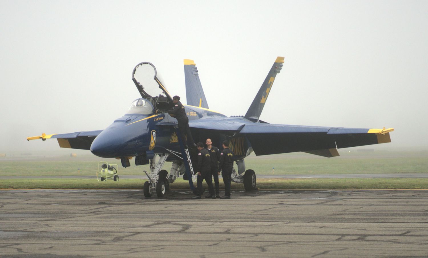 Aviation, blue angels. Crew is checking on the aircraft