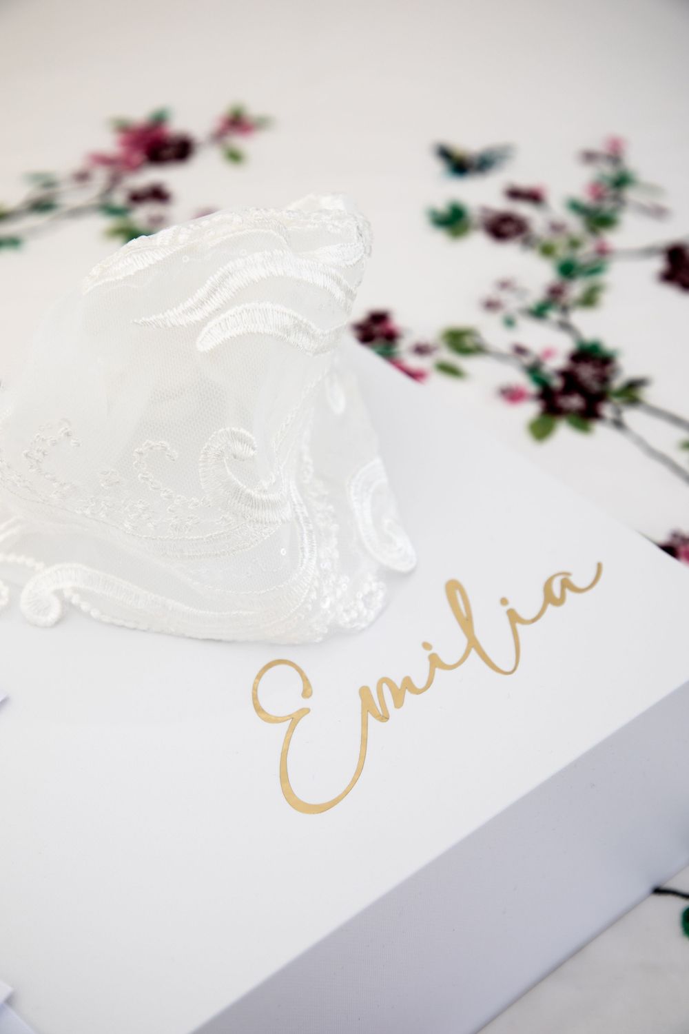 baby on christening with mother and father and godmother