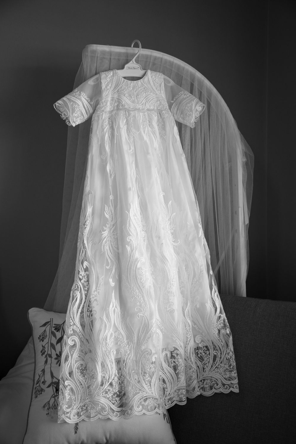 baby on christening with mother and father and godmother