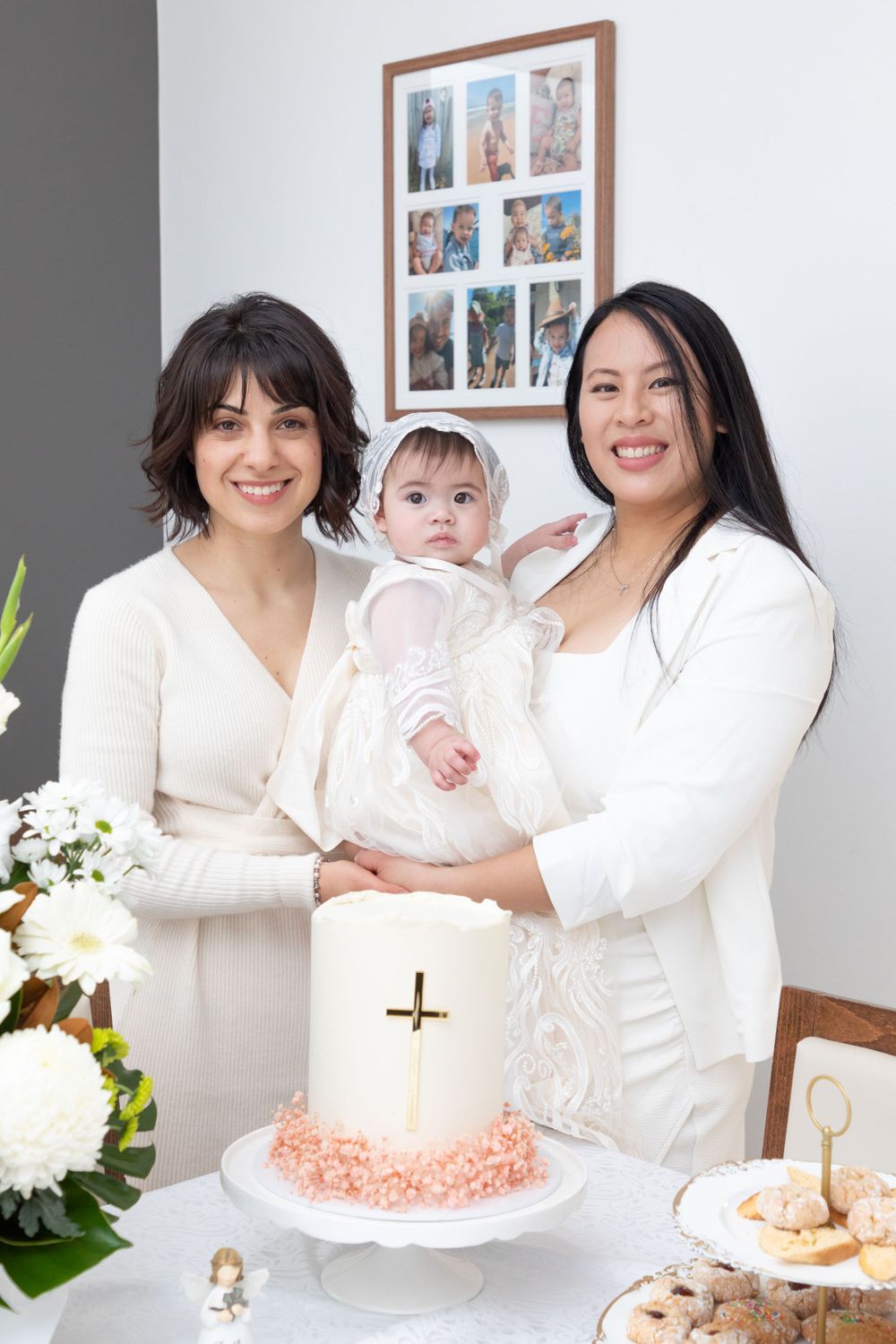 baby on christening with mother and godmother