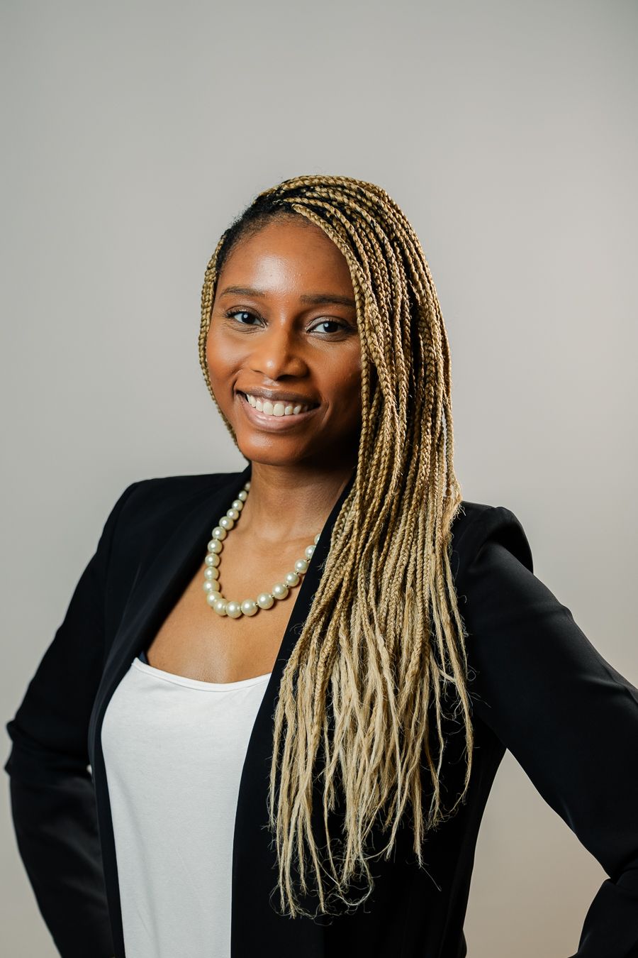 Professional woman in black blazer, South Florida business headshot by Mannyportraits for law, medicine, and executives.