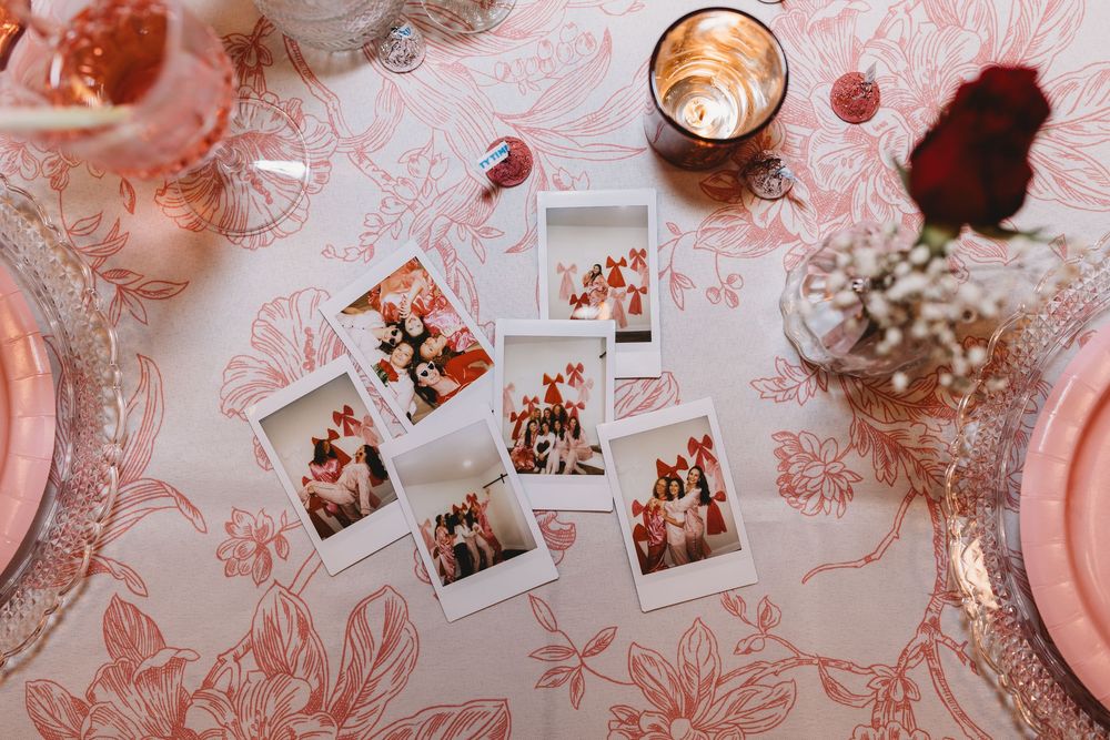 flat lay valentines polaroids French toile pink rose