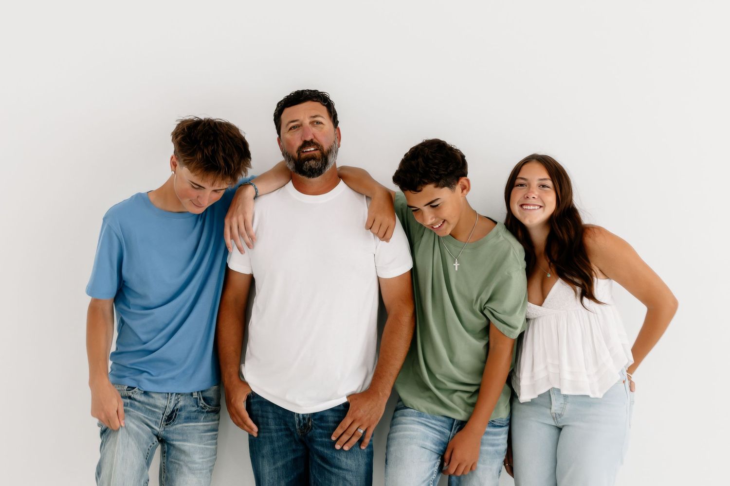 Austin family photography highlighting connection, love, and natural moment in indoor studio session