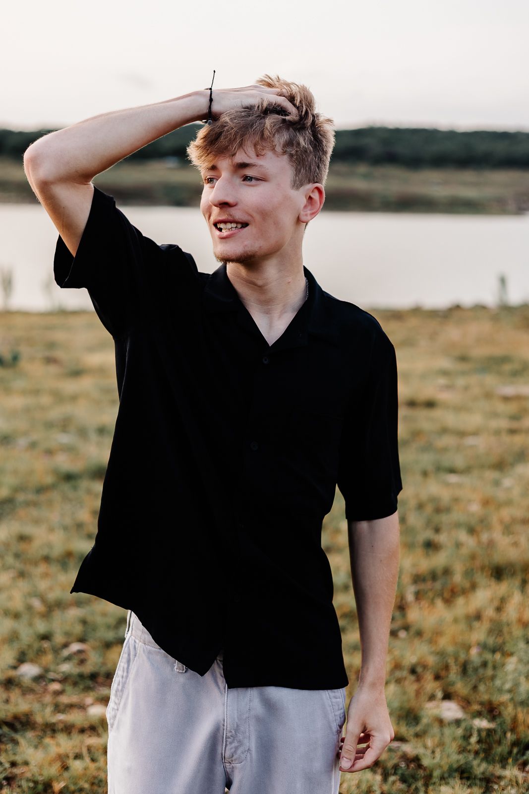 Austin senior photographer captures high school senior outdoors at Lake Travis in Austin TX